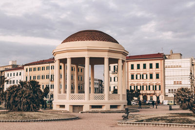 Building against cloudy sky