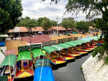 High angle view of boats in river against sky