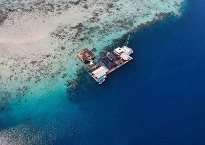 High angle view of ship sailing in sea