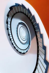 Directly below shot of spiral staircase in building