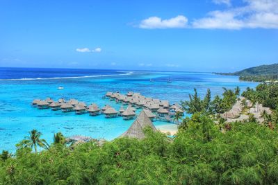 Scenic view of calm sea against cloudy sky