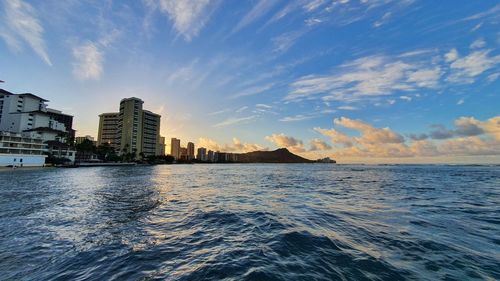 Scenic view of sea against sky during sunrise in waikiki, honolulu