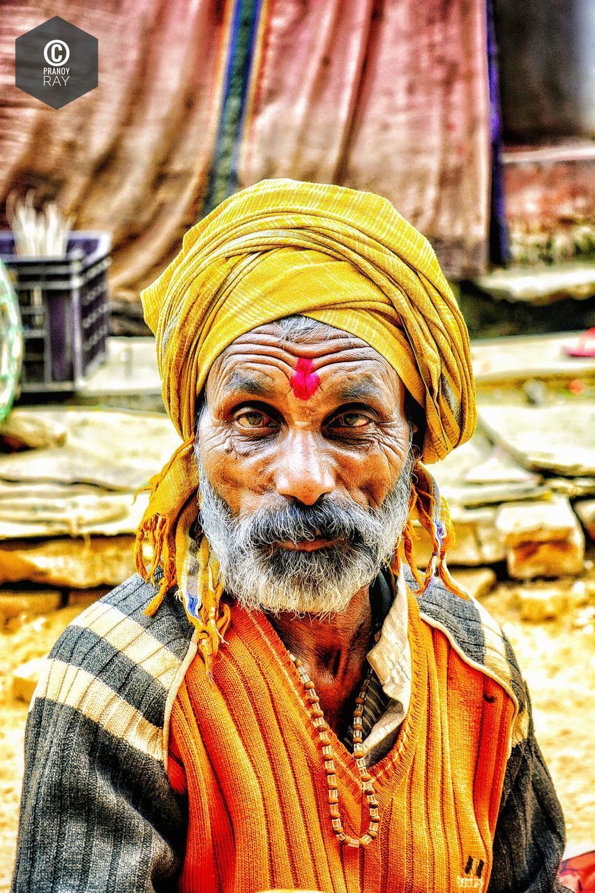 PORTRAIT OF MAN WEARING HAT ON OUTDOORS