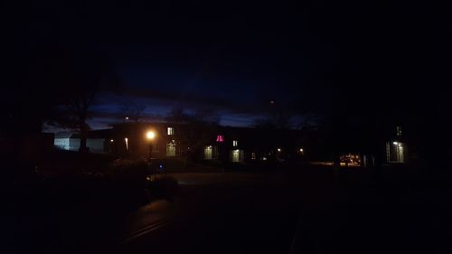 Illuminated street light at night