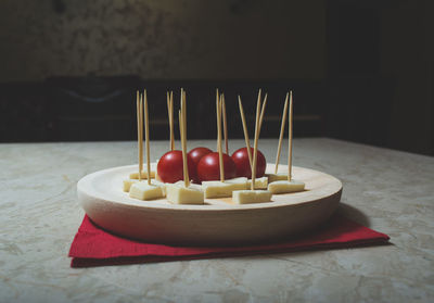 Close-up of fruits in plate on table