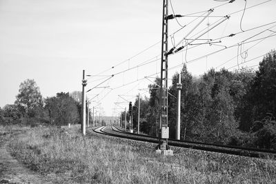 Train on railroad track against sky