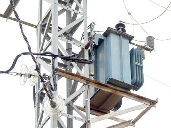 Low angle view of cables against the sky