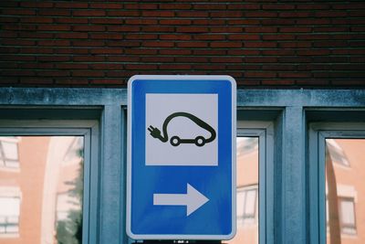 Electric car traffic signal on the road in the street