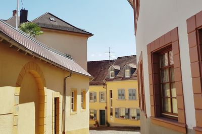 Houses against sky in town