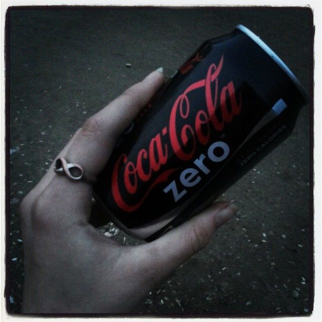 person, transfer print, part of, holding, personal perspective, cropped, lifestyles, close-up, auto post production filter, leisure activity, human finger, unrecognizable person, text, red, street, communication