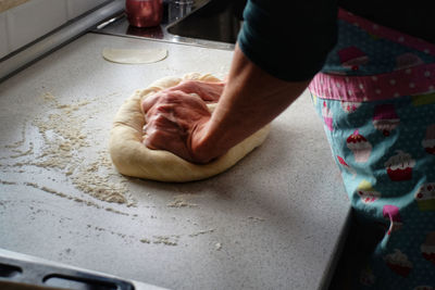 High angle view of person preparing food in kitchen