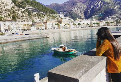 Woman looking at river 