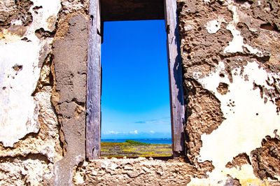 Scenic view of sea against blue sky