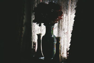 Close up of electric lamp against black background