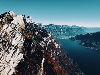 Scenic view of snowcapped mountain against sky