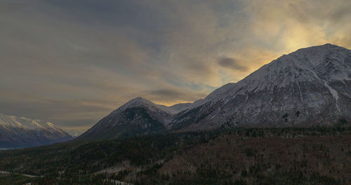 Scenic view of mountains against sky during sunset