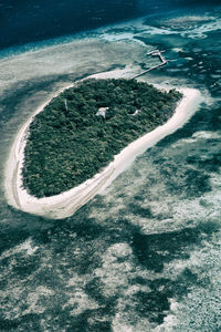 High angle view of land by sea