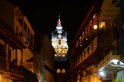 Low angle view of illuminated street light at night