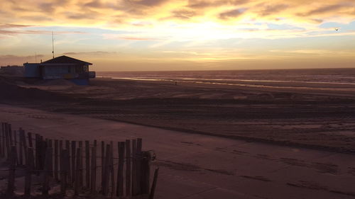 Scenic view of sea at sunset