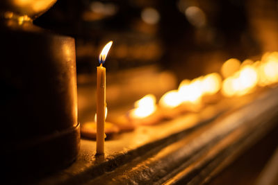 Close-up of illuminated light candles