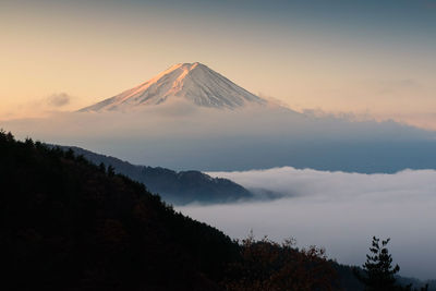 Scenic view of mountains against sky during sunset