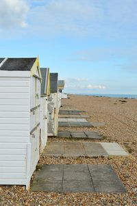 Built structure on beach against sky