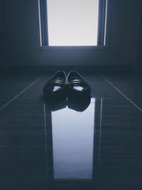 Shoes on tiled floor at home
