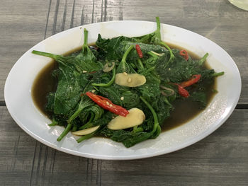 High angle view of salad in bowl on table