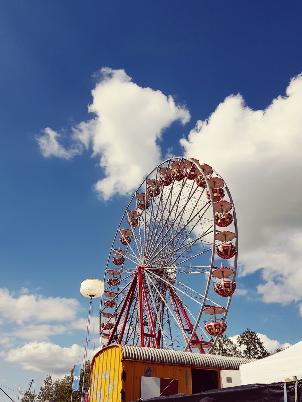 FERRIS WHEEL AGAINST SKY