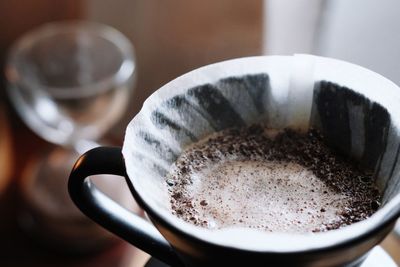 Close-up of coffee cup on table