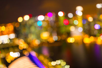 Defocused image of illuminated lights at night