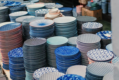High angle view of ceramics for sale at market stall