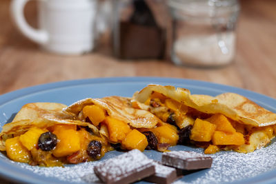 Close-up of dessert served on table