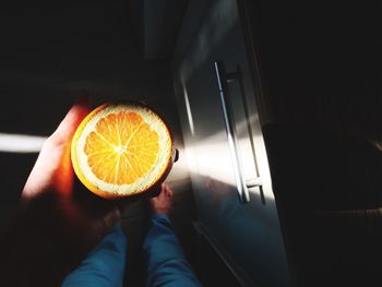 High angle view of hand holding ice cream