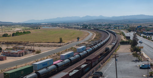 High angle view of cars on road against sky