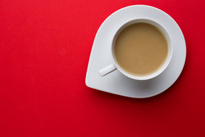 Directly above shot of coffee cup on table