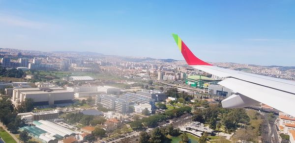 High angle view of buildings in city against sky