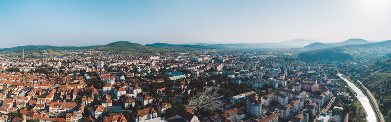 High angle view of crowd in city against sky