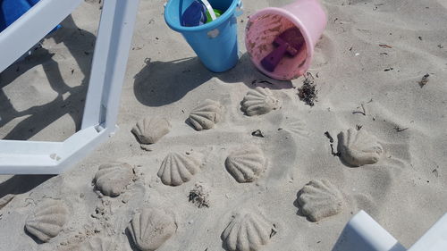 High angle view of footprints on beach