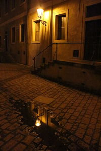 Illuminated street light at night