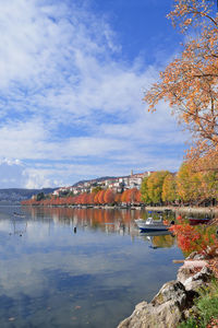 Autumn scene at kastoria lake waterfront in greece