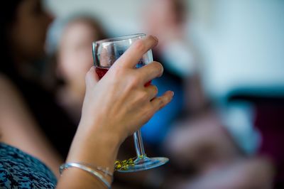 Close-up of woman hand holding drink