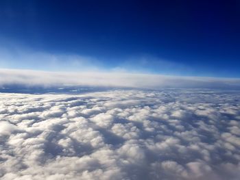 Aerial view of cloudscape against blue sky