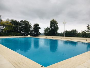 High angle view of swimming pool against sky