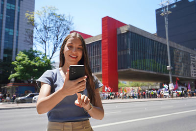 Young woman using mobile phone