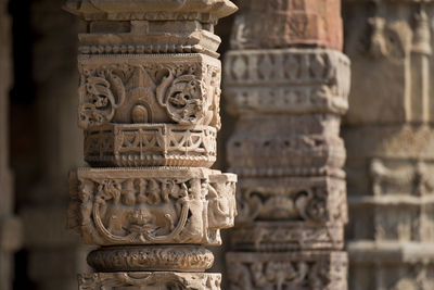 Close-up of carvings on column