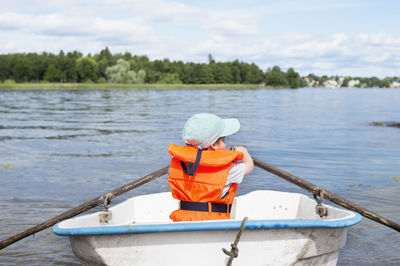 Boy in rowing boat