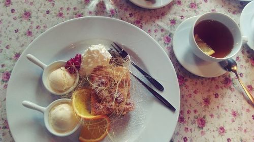 High angle view of breakfast served on table