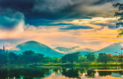 Scenic view of lake with mountains in background