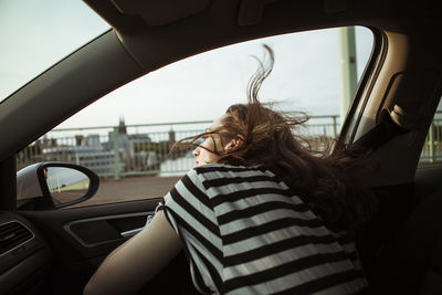 Portrait of woman in car